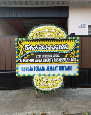 Papan Bunga Duka di Sinindian